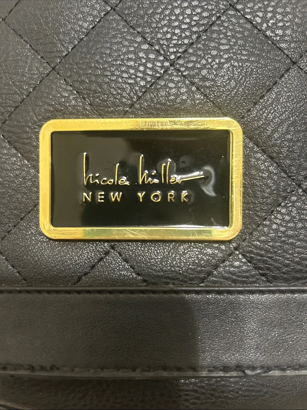 Nicole Miller Black Quilted Backpack with Gold Accents